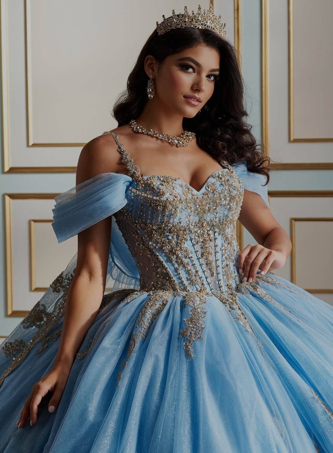 Model wearing a blue gown