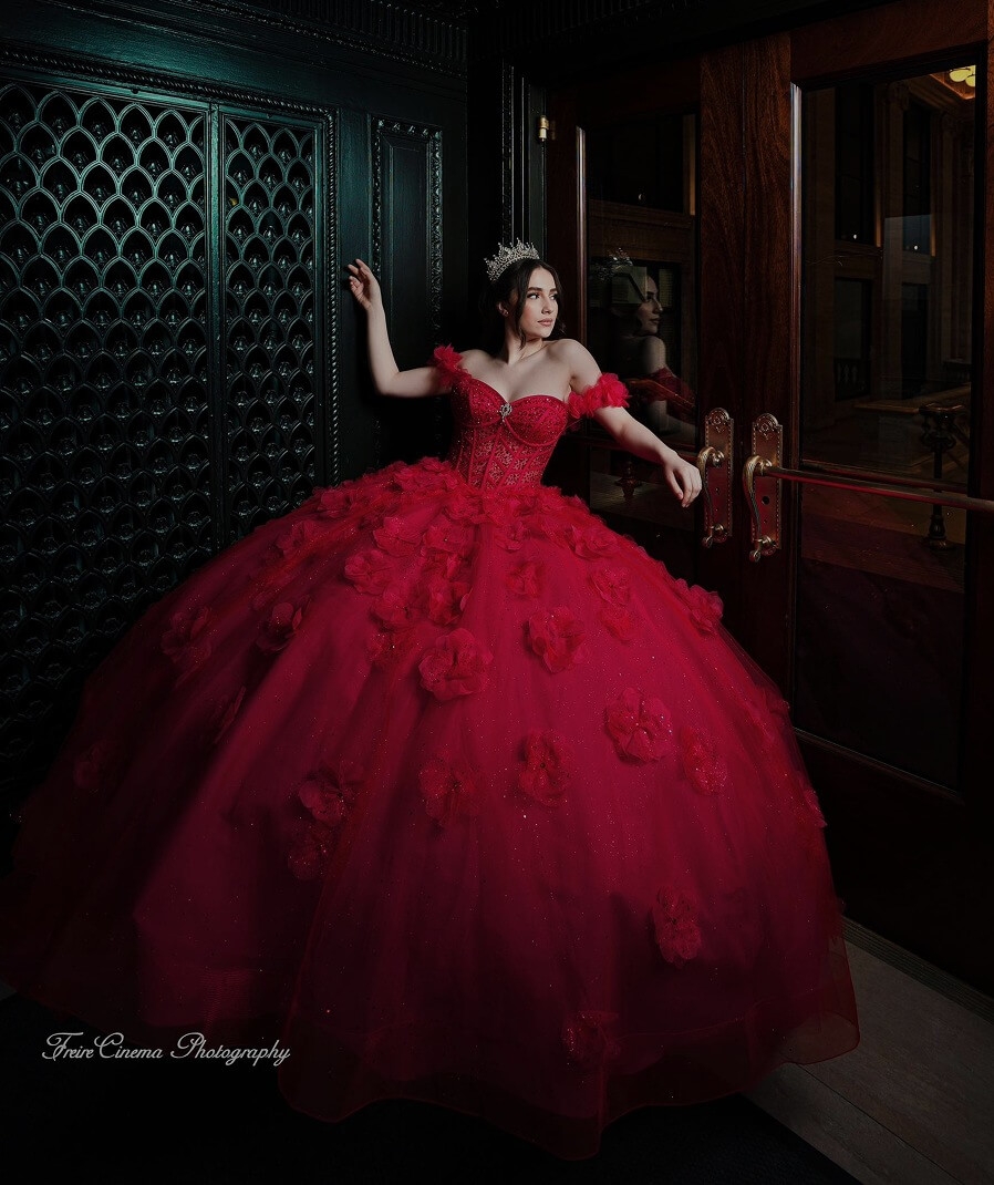 Model wearing a red dress at home