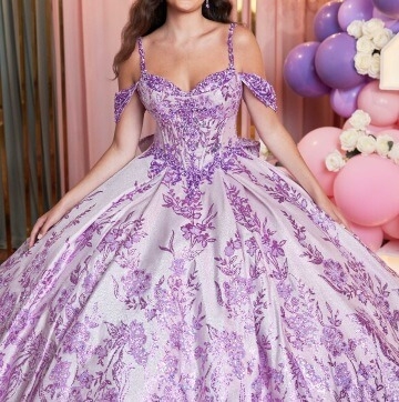 Model wearing a purple gown