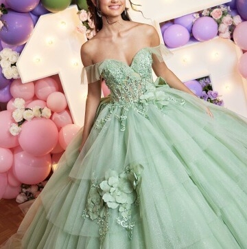 Model wearing a green gown